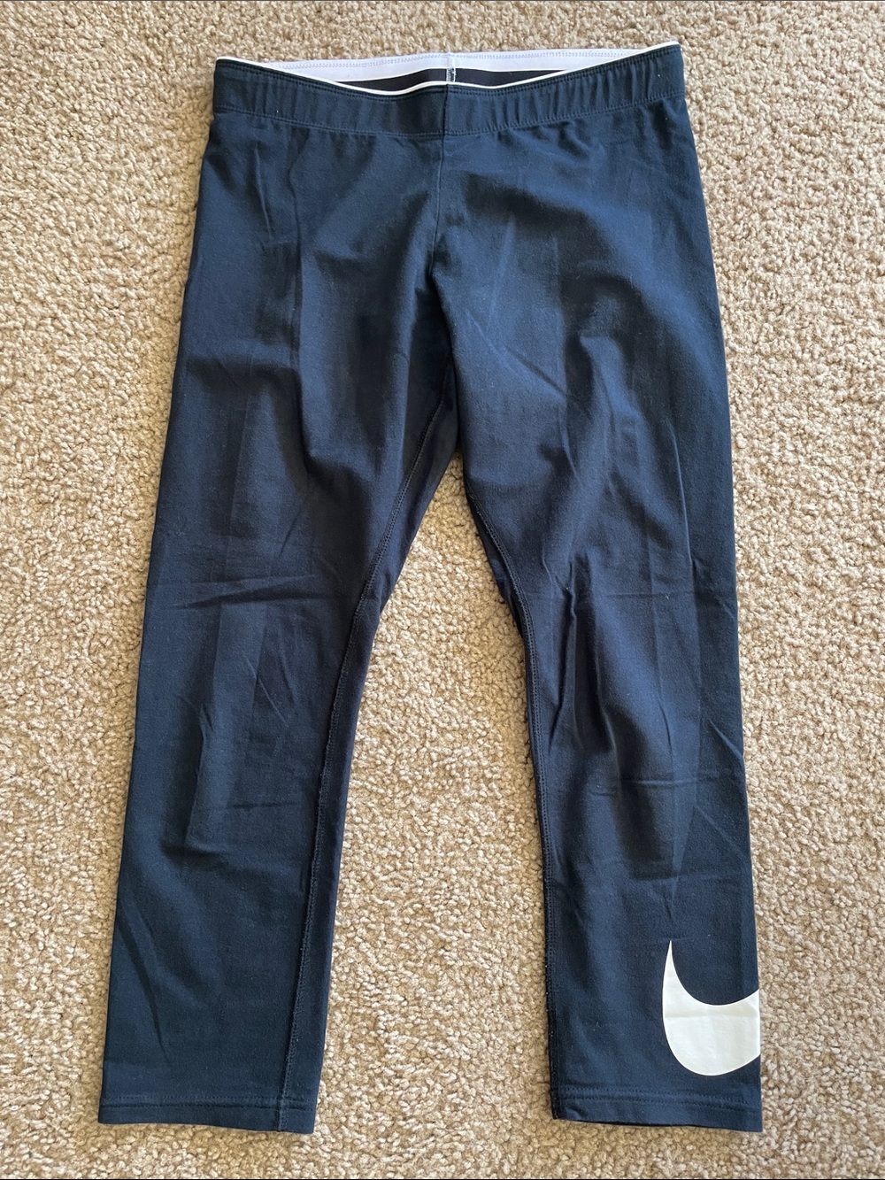 Nike Black Cropped Leggings with White Swoosh Accent